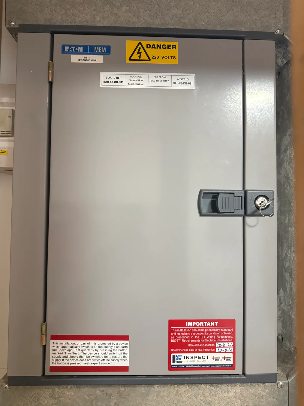 Labelled second-floor electrical distribution board