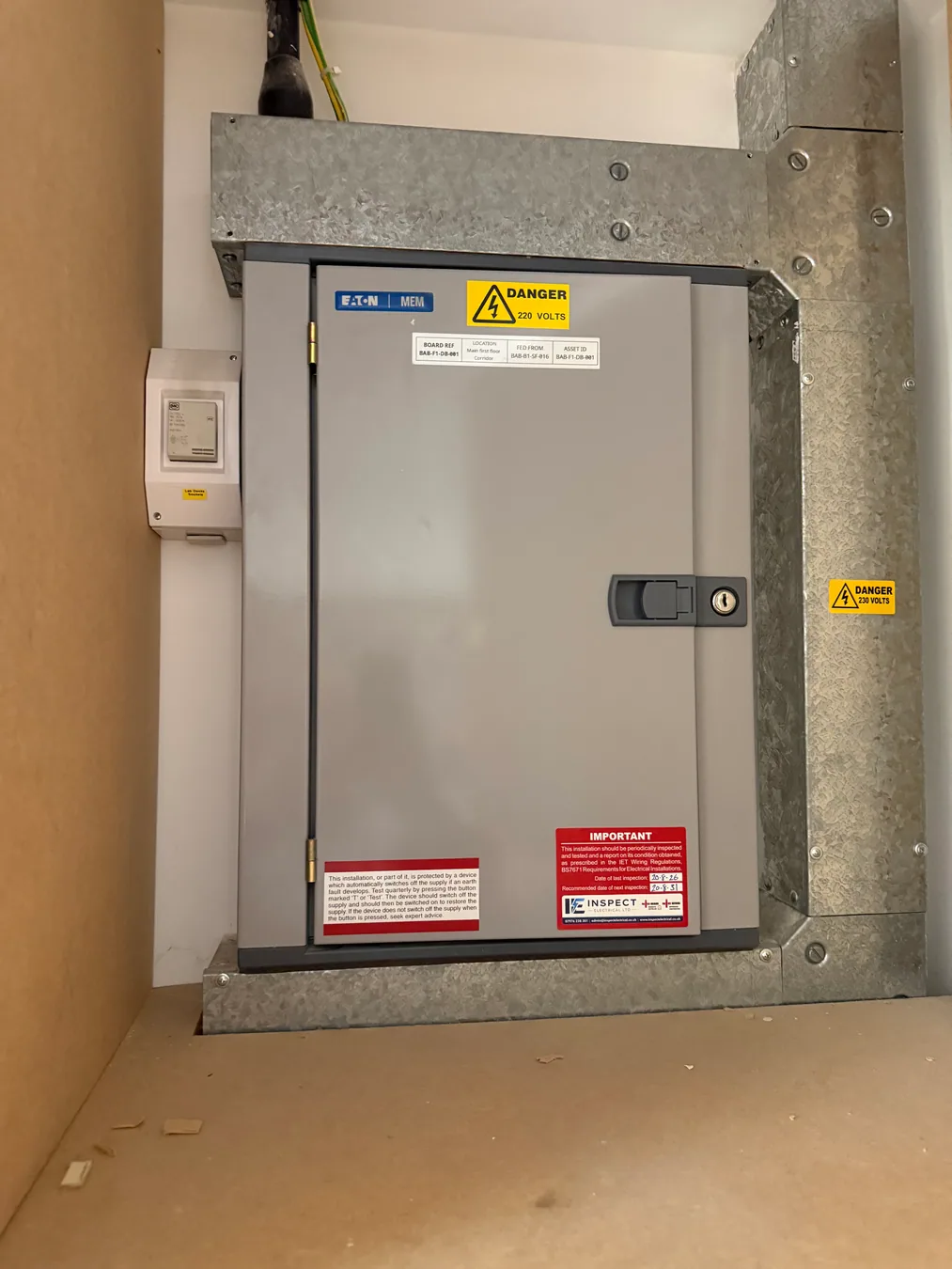 Distribution board with asset reference and location labels